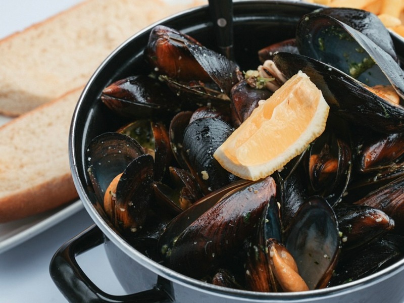 Мідії в оливкивій олії